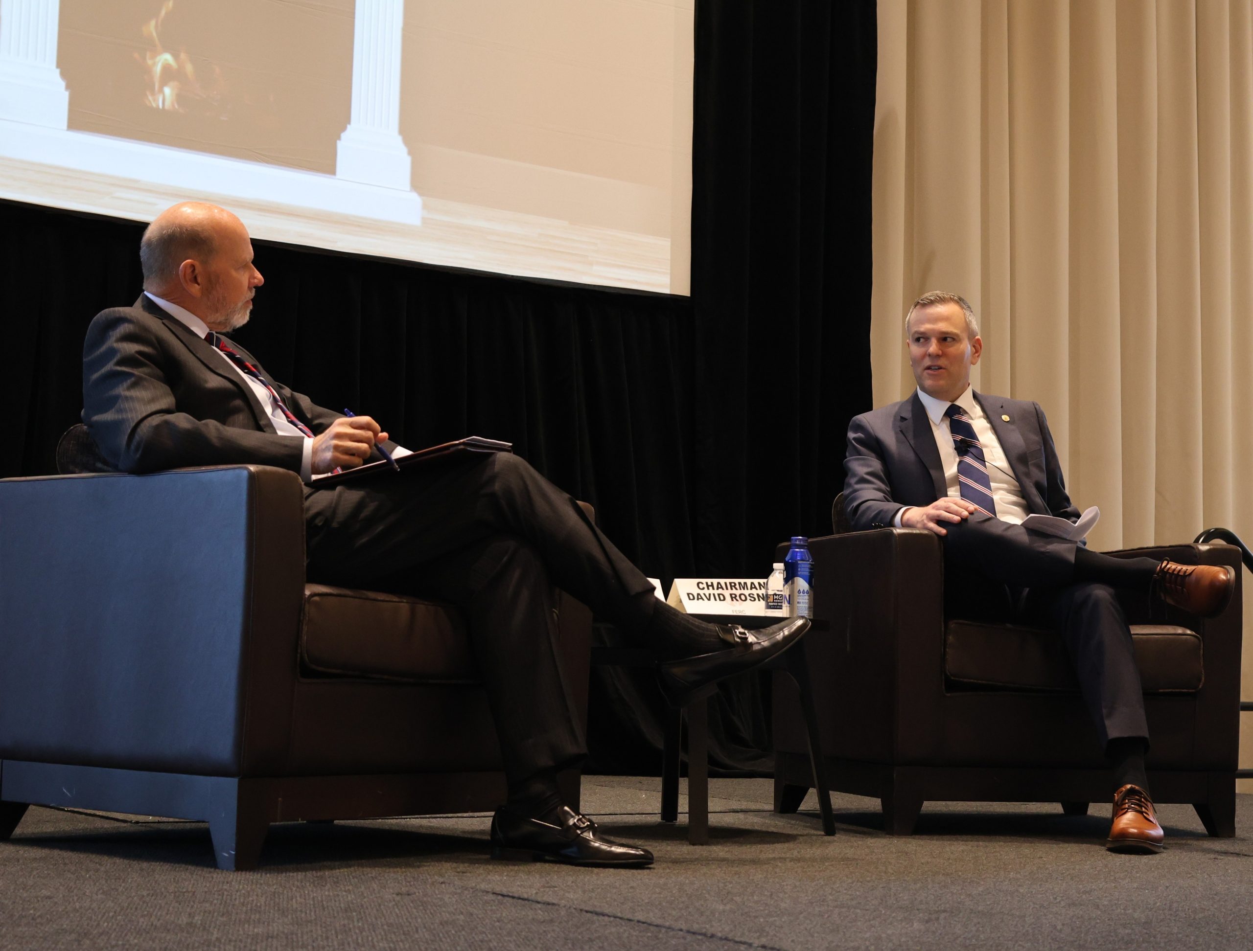 FERC Chairman David Rosner speaks with NERC President and CEO Jim Robb on stage at RF's Fall Reliability and Security Summit in Oxon Hill, Maryland, on Sept. 9, 2025.